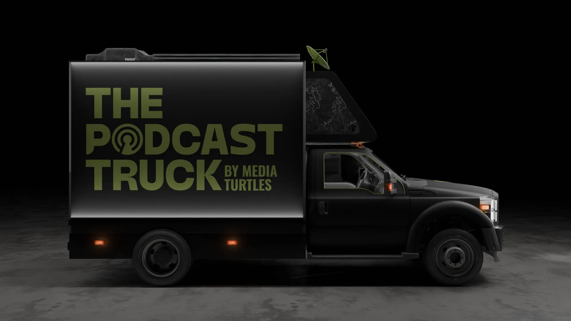 Black podcast truck with large text 'THE PODCAST TRUCK BY MEDIA TURTLES' on its side and a satellite dish on top.